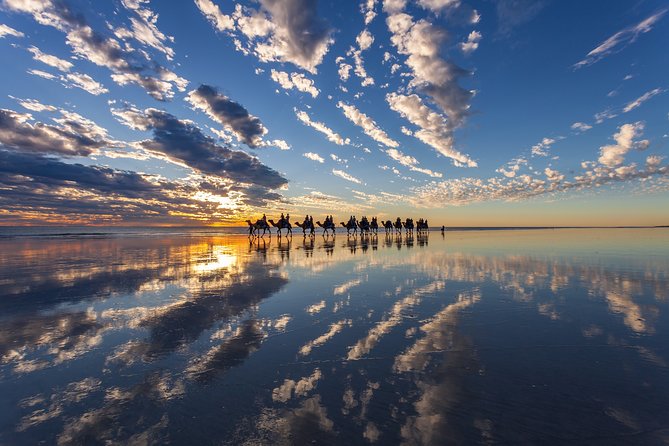 1 Hour Broome Sunset Camel Tour - Climbing aboard a padded saddle
