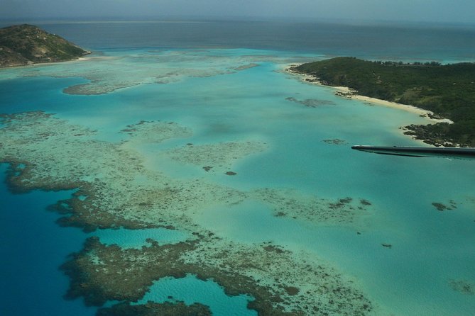 1-Hour Whitsunday Islands and Heart Reef Scenic Flight - Whitehaven Beach and the two passes over Hill Inlet