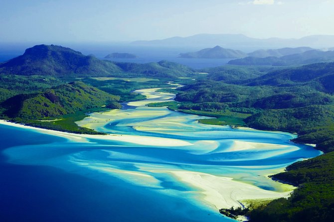 1-Hour Whitsunday Islands and Heart Reef Scenic Flight - The first view of the Whitsunday Islands