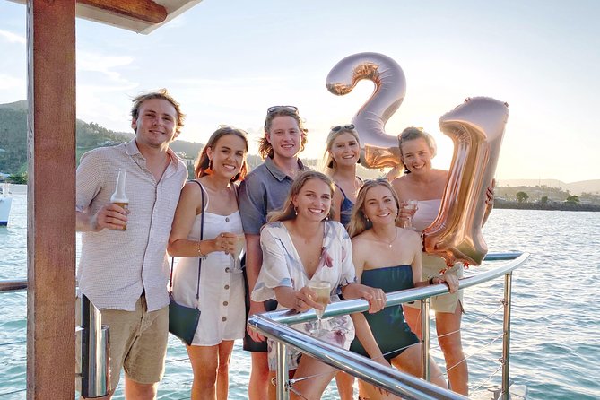 Airlie Beach Sunset Cruise - A drink, simple nibbles, and the onboard bar