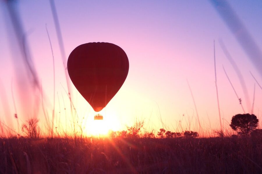 Alice Springs: Early Morning Hot Air Balloon Flight - Floating above the Central Australian outback