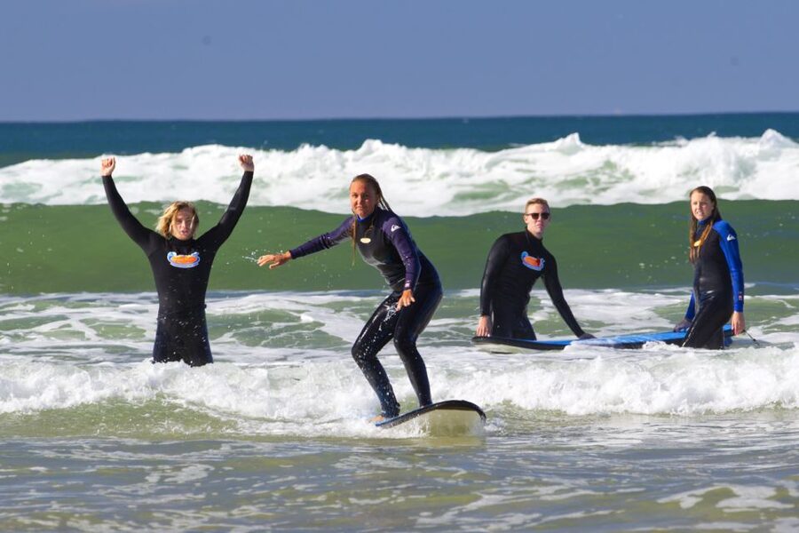Anglesea: 2 Hour Surf Experience on the Great Ocean Road - Wading out to waist depth at Anglesea Beach