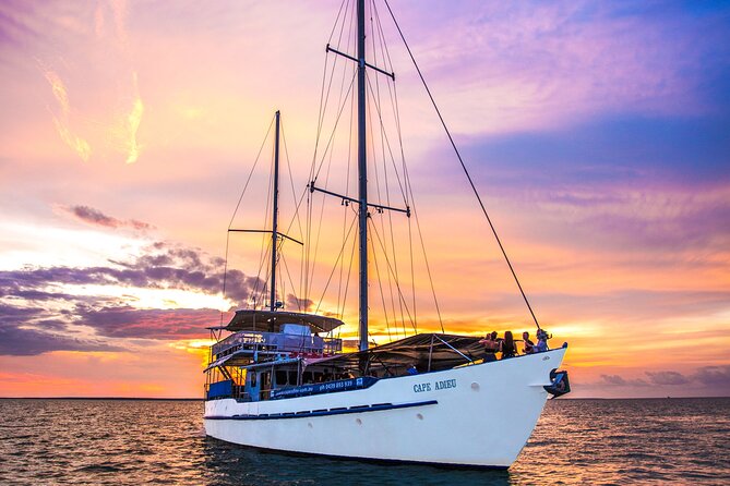 Cape Adieu Darwin Sunset Dinner Cruise - Drinks, music, and the mood onboard