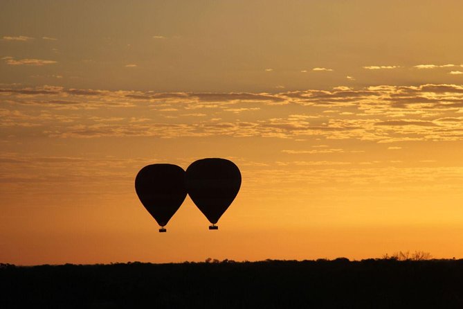 Early Morning Ballooning in Alice Springs - Watching the balloon come alive before takeoff