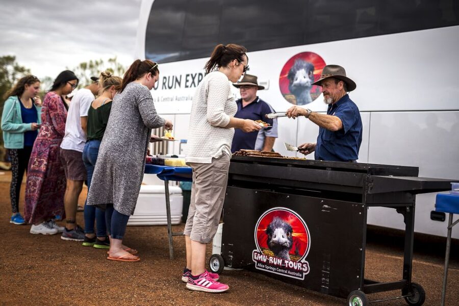 From Ayers Rock Resort: Uluru Sunset Barbecue Dinner - Setting up at the sunset viewing area
