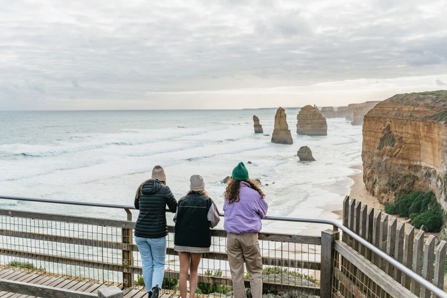 From Melbourne: Small-Group Great Ocean Road Day Trip - Walking through an ancient rainforest