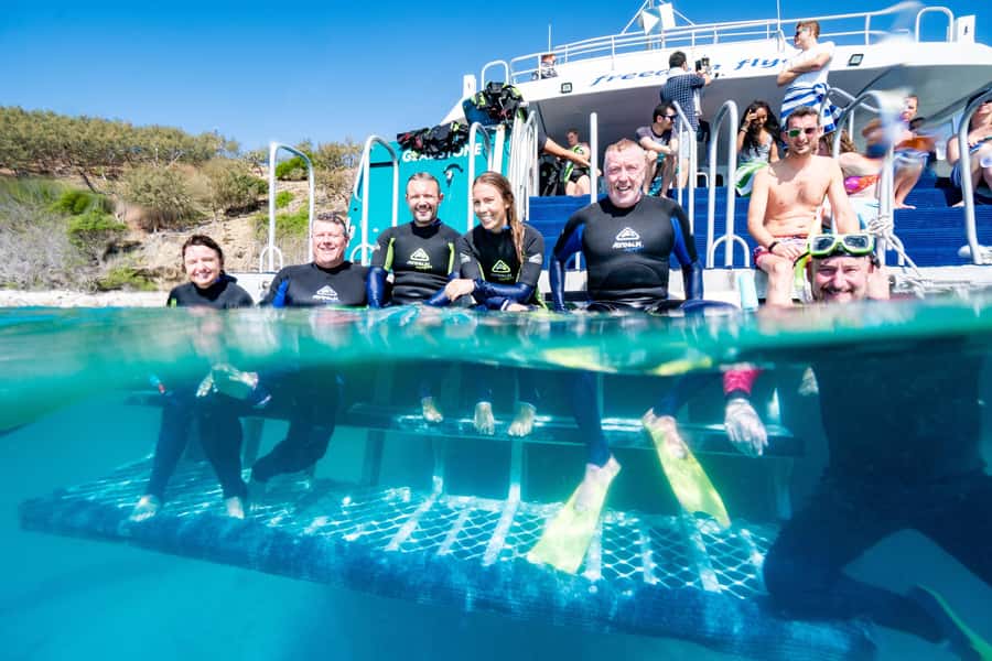From Rosslyn: Great Keppel Island Adventure Tour with Lunch - Boom netting brings the comic relief