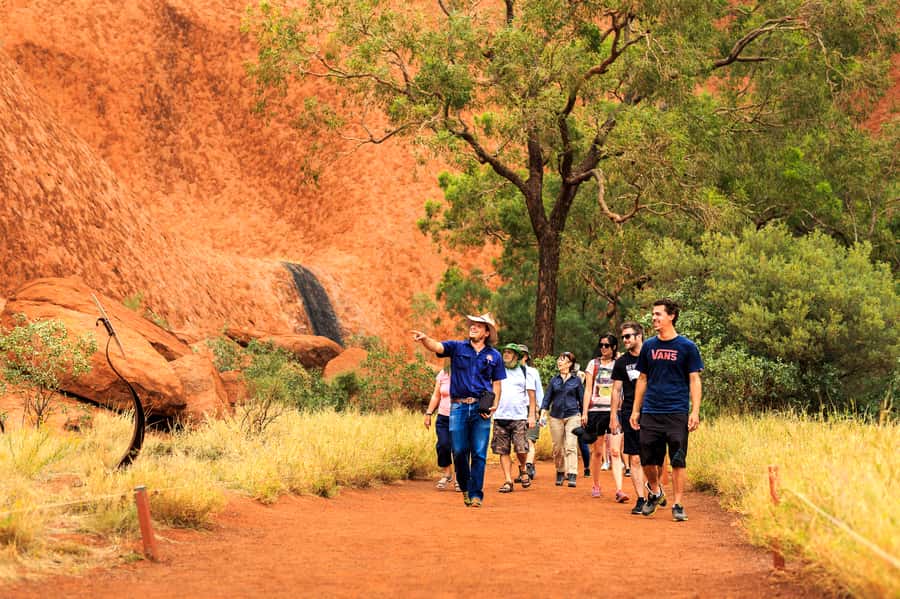 From Yulara: Uluru Tour and Sunset BBQ - Sunset at the coach viewing area