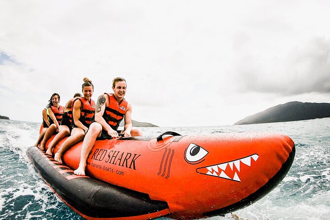 Full-Day Whitsunday Sail and Snorkel Adventure with Lunch - Beach time, views, and a little banana boat chaos