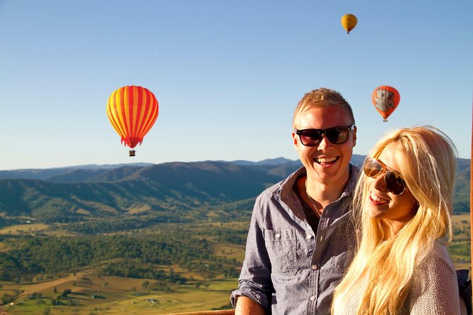 Gold Coast Hot Air Balloon + Winery Breakfast + Return Transfers - Floating above vineyards, pasture, and forest