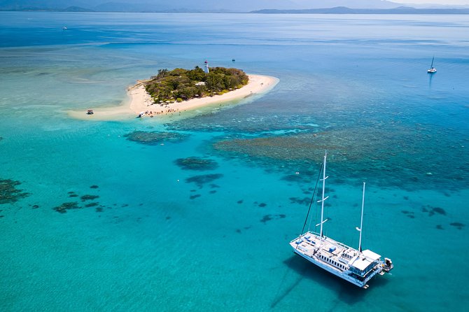 Half Day Low Isles Snorkelling Tour from Port Douglas - Walking the tiny island and taking a break