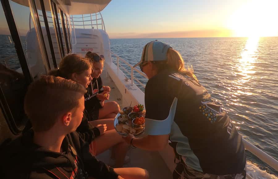 Hervey Bay: Half-Day Whale Watching Cruise with Meal - Listening to whales through the hydrophone
