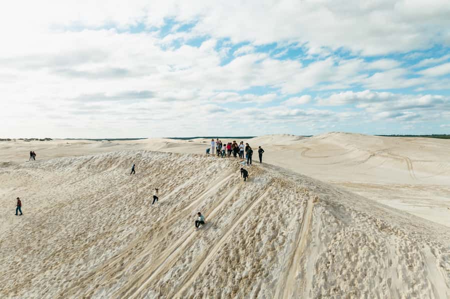 Pinnacles Desert: Sunset BBQ & Stargazing Tour +Sandboarding - Lancelin sandboarding on soft white dunes