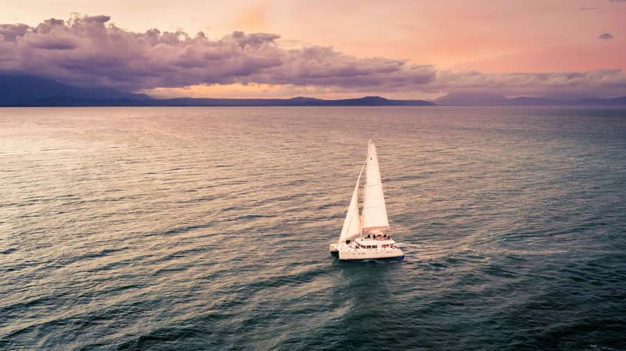 Port Douglas: Sunset Sailing Cruise on Luxury Catamaran - Service, music, and the small-group atmosphere