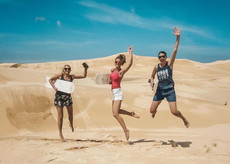 Port Stephens: Unlimited Sandboarding with 4WD Dune Transfer - Sit-down boarding is the easy entry point